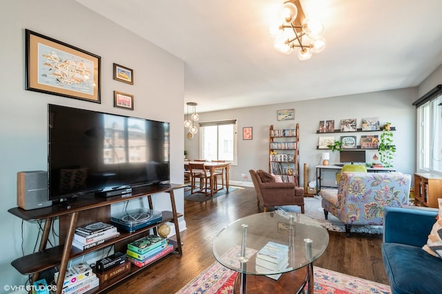 4248 N Keystone Ave Unit 2C, Chicago, IL 60641 - living room featuring wood finished floors and a chandelier