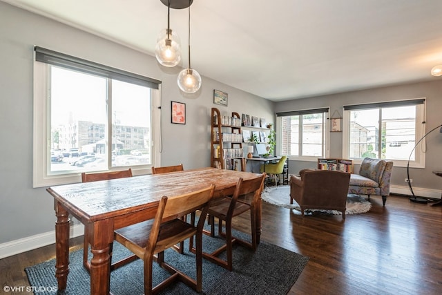 4248 N Keystone Ave Unit 2C, Chicago, IL 60641 - dining area featuring dark wood finished floors, baseboard heating, and a desk