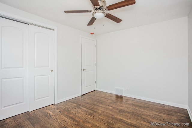 9206 S Yates Blvd, Chicago, IL 60617 - unfurnished bedroom featuring wood finished floors, a closet, and a ceiling fan