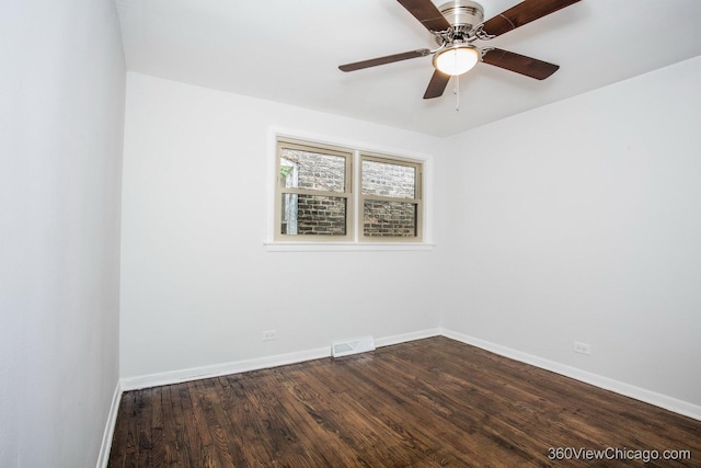 9206 S Yates Blvd, Chicago, IL 60617 - unfurnished room featuring dark wood-style flooring and ceiling fan
