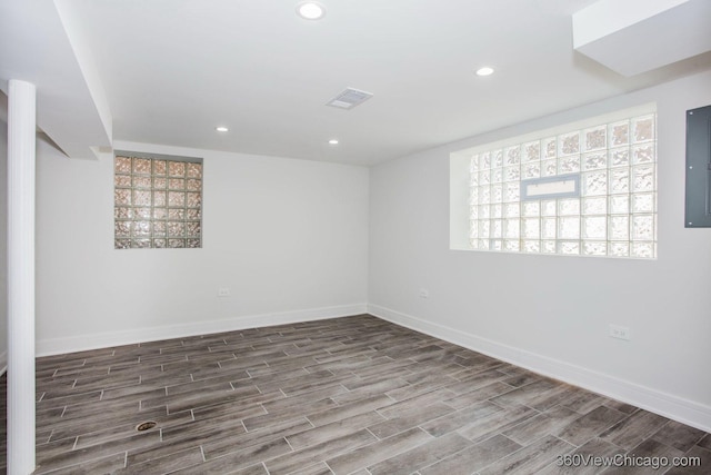 9206 S Yates Blvd, Chicago, IL 60617 - unfurnished room with wood finished floors, recessed lighting, and electric panel