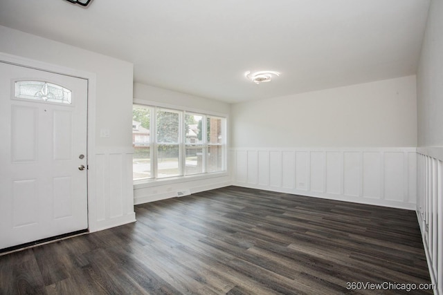 9206 S Yates Blvd, Chicago, IL 60617 - entrance foyer with a wainscoted wall, dark wood-style flooring, and a decorative wall