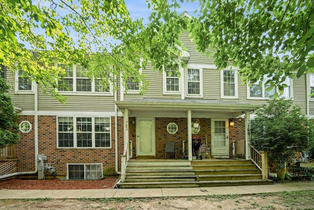 763 Highview Ct, Antioch, IL 60002 - traditional-style house with a porch and brick siding