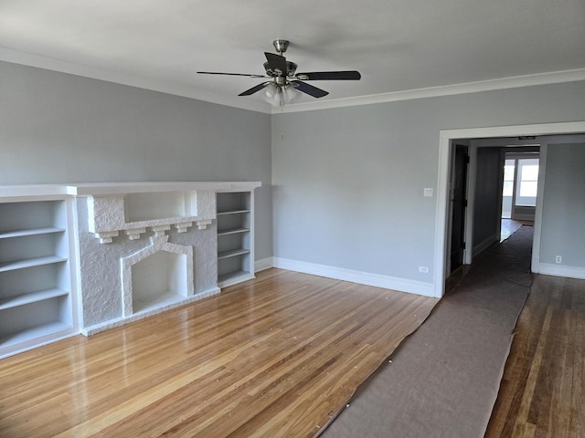 7543 S Yates Blvd, Chicago, IL 60649 - unfurnished living room with ornamental molding, wood finished floors, ceiling fan, and built in shelves