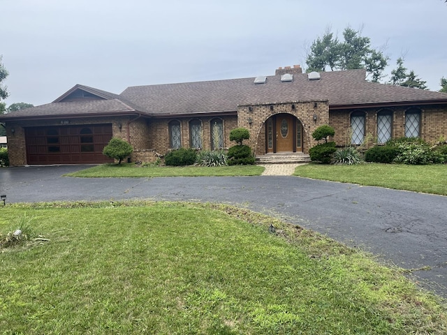 10S220 Hampshire Ln W, Willowbrook, IL 60527 - ranch-style home with driveway, brick siding, a garage, and roof with shingles