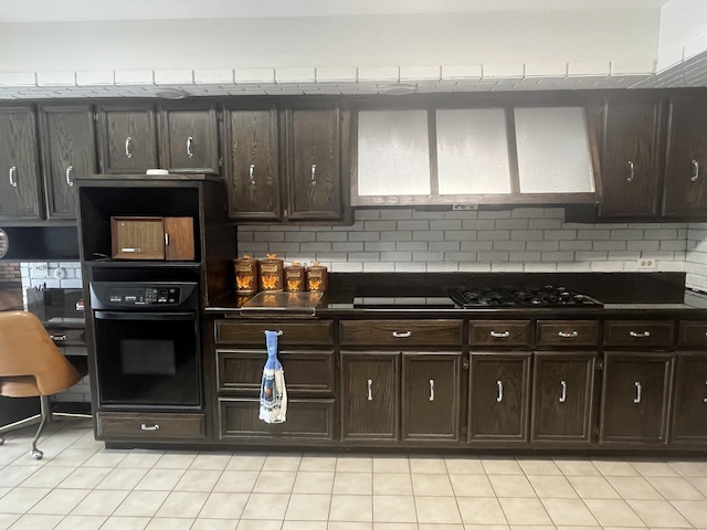 10S220 Hampshire Ln W, Willowbrook, IL 60527 - kitchen with oven, dark countertops, gas stovetop, and dark brown cabinetry