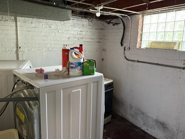 8114 S Anthony Ave, Chicago, IL 60617 - below grade area featuring washer and clothes dryer