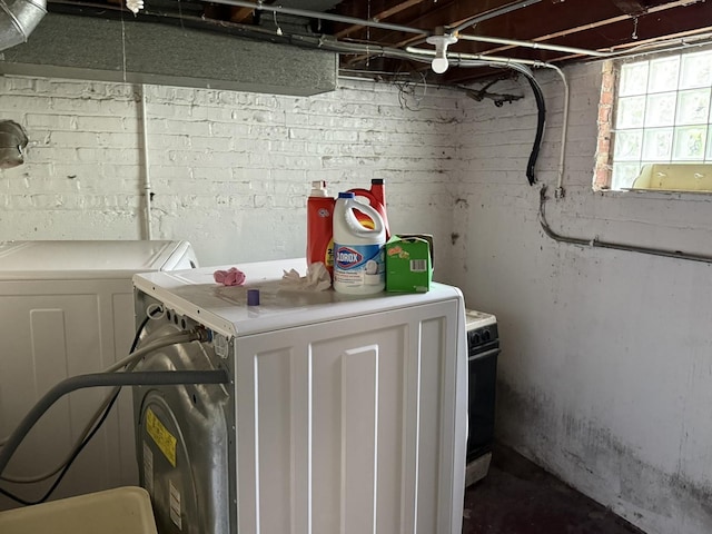 8114 S Anthony Ave, Chicago, IL 60617 - basement featuring independent washer and dryer