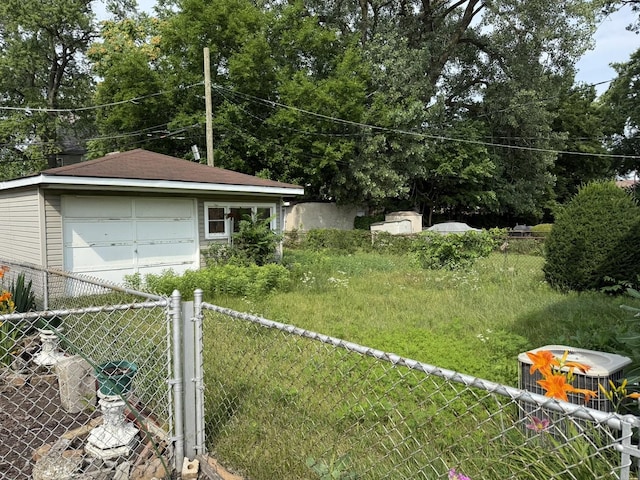 8114 S Anthony Ave, Chicago, IL 60617 - view of yard featuring a detached garage and an outdoor structure
