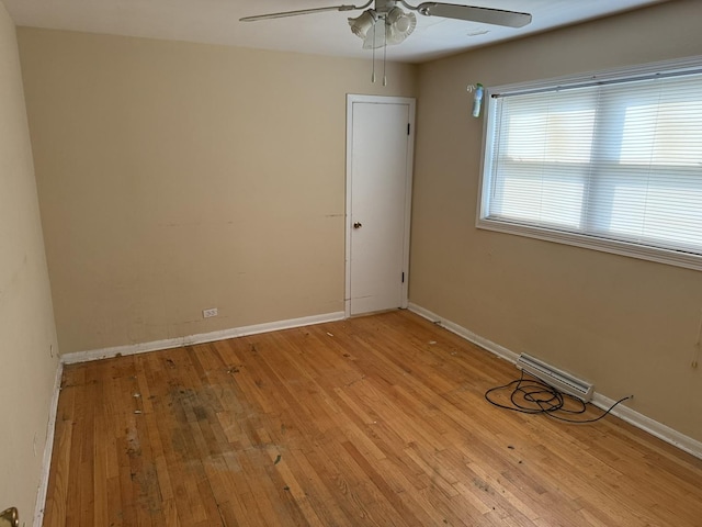 8114 S Anthony Ave, Chicago, IL 60617 - empty room featuring ceiling fan and light wood finished floors