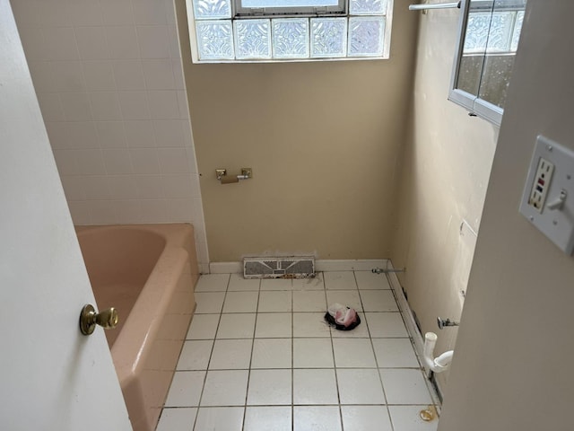 8114 S Anthony Ave, Chicago, IL 60617 - full bath with a tub and tile patterned flooring