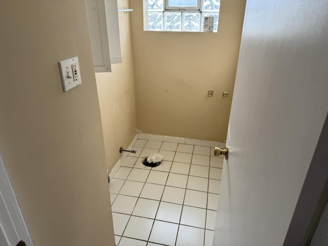 8114 S Anthony Ave, Chicago, IL 60617 - washroom with tile patterned flooring and baseboards