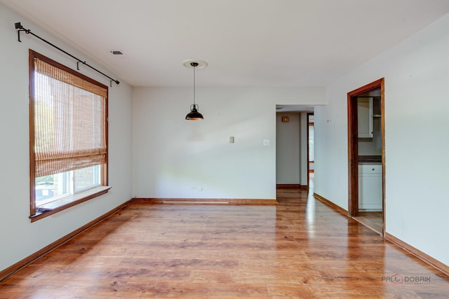 1499 Shermer Rd Unit 204E, Northbrook, IL 60062 - spare room featuring light wood-style floors and baseboards