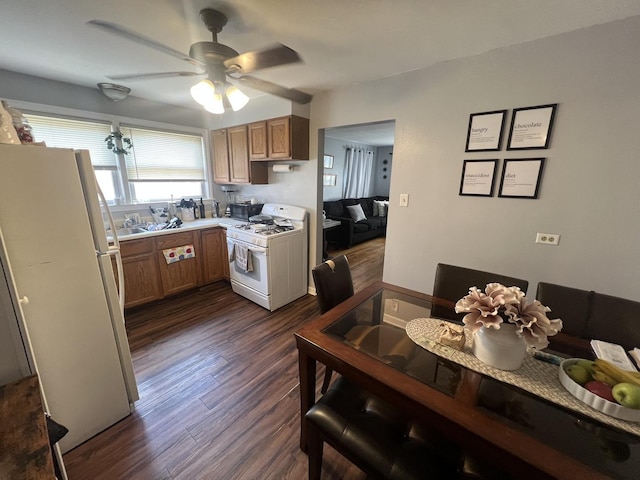 9013 La Crosse Ave, Skokie, IL 60077 - kitchen with white appliances, a ceiling fan, dark wood-style flooring, light countertops, and brown cabinetry