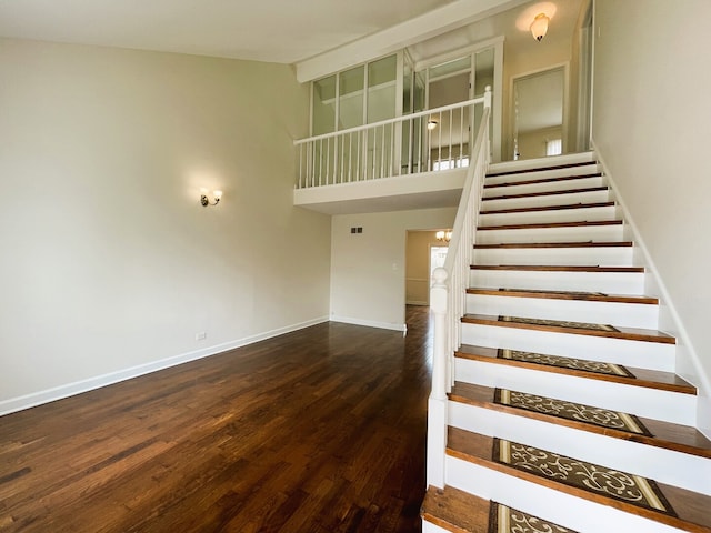 8148 W 111th St Unit C3, Palos Hills, IL 60465 - stairway featuring high vaulted ceiling and wood finished floors