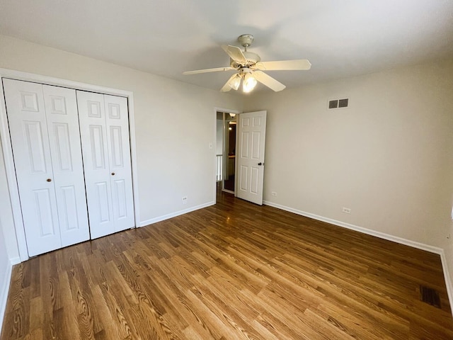 8148 W 111th St Unit C3, Palos Hills, IL 60465 - unfurnished bedroom with wood finished floors, a closet, and a ceiling fan