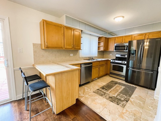 8148 W 111th St Unit C3, Palos Hills, IL 60465 - kitchen with stainless steel appliances, open shelves, tile counters, and healthy amount of natural light