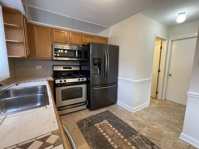 8148 W 111th St Unit C3, Palos Hills, IL 60465 - kitchen featuring appliances with stainless steel finishes, tile countertops, brown cabinets, open shelves, and tasteful backsplash