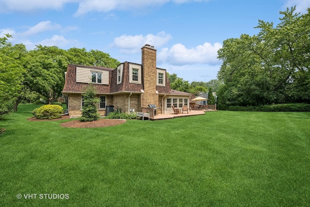 195 Cold Spring Rd, Barrington, IL 60010 - rear view of house featuring a lawn, a chimney, a shingled roof, brick siding, and a gambrel roof