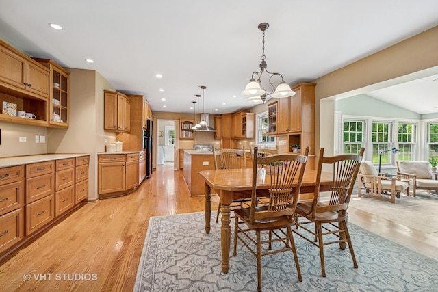 195 Cold Spring Rd, Barrington, IL 60010 - dining space featuring light wood finished floors, a chandelier, vaulted ceiling, and recessed lighting