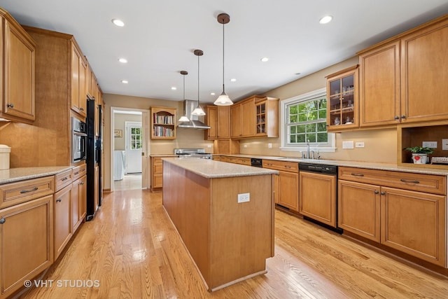 195 Cold Spring Rd, Barrington, IL 60010 - kitchen featuring wall chimney exhaust hood, dishwasher, a kitchen island, stove, and light wood finished floors