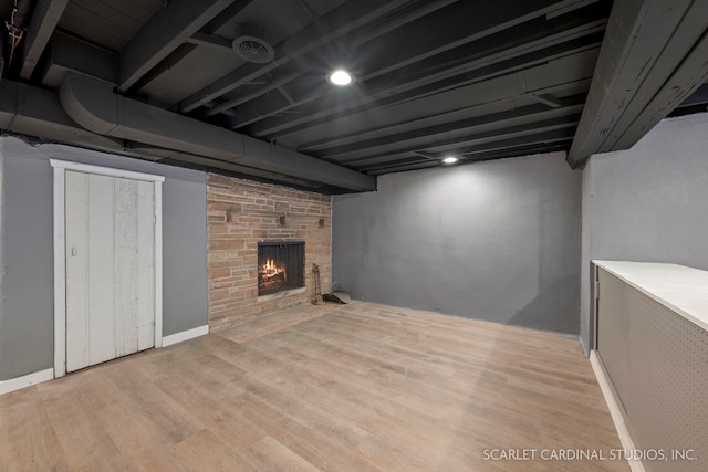 944 S Harvard Ave, Villa Park, IL 60181 - finished below grade area featuring light wood-type flooring and a fireplace