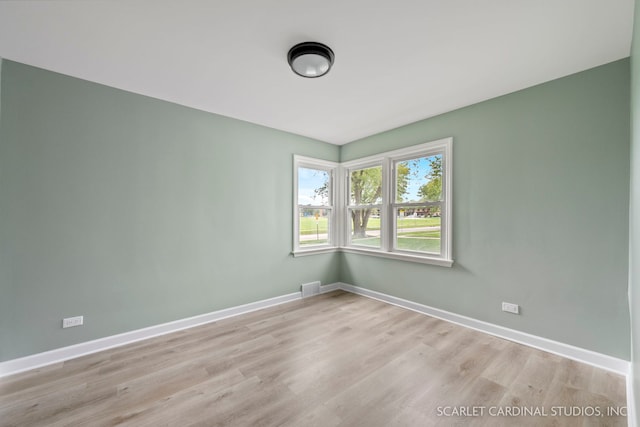 944 S Harvard Ave, Villa Park, IL 60181 - spare room with light wood finished floors and baseboards
