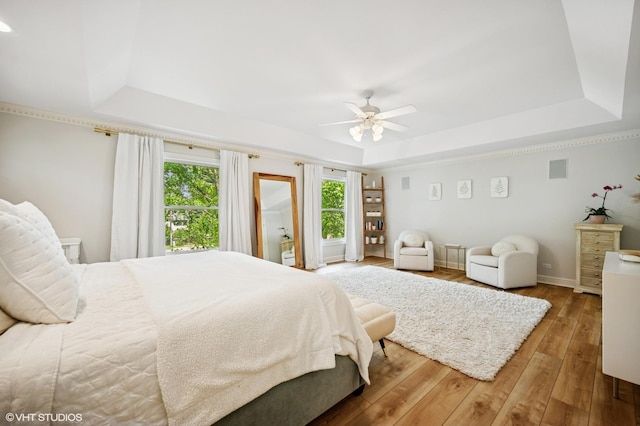 2007 Wilmette Ave, Wilmette, IL 60091 - bedroom with a tray ceiling, hardwood / wood-style floors, and a ceiling fan