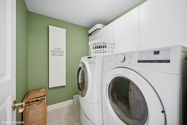 2007 Wilmette Ave, Wilmette, IL 60091 - washroom featuring cabinet space, separate washer and dryer, and light tile patterned flooring
