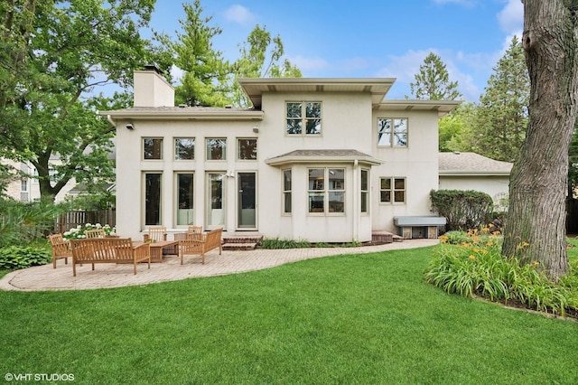 2007 Wilmette Ave, Wilmette, IL 60091 - rear view of property with stucco siding, a chimney, and a patio area