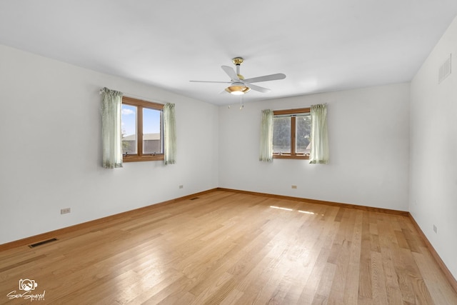 4849 W Kennedy Rd, Peotone, IL 60468 - empty room featuring plenty of natural light, ceiling fan, and light wood-style floors