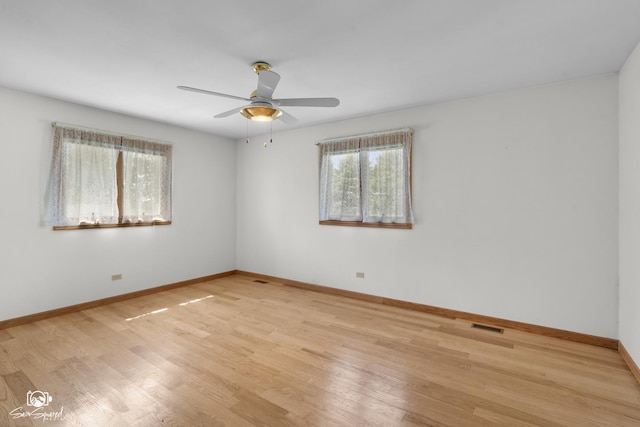 4849 W Kennedy Rd, Peotone, IL 60468 - unfurnished room featuring a ceiling fan and wood finished floors