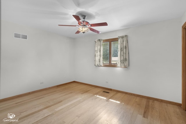 4849 W Kennedy Rd, Peotone, IL 60468 - unfurnished room with light wood-style floors and a ceiling fan