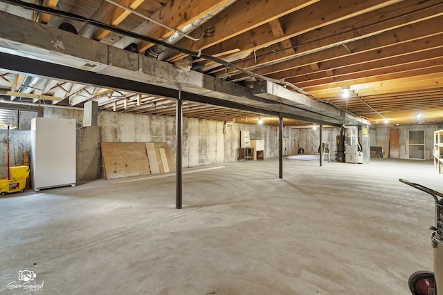 4849 W Kennedy Rd, Peotone, IL 60468 - unfinished below grade area featuring freestanding refrigerator and water heater