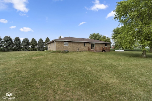 4849 W Kennedy Rd, Peotone, IL 60468 - view of green lawn featuring a wooden deck
