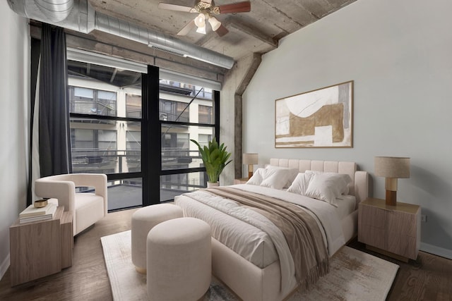 1070 W 15th St Unit 201, Chicago, IL 60608 - bedroom with wood finished floors and baseboards