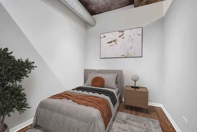 1070 W 15th St Unit 201, Chicago, IL 60608 - bedroom with wood finished floors and baseboards