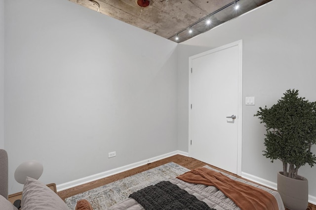 1070 W 15th St Unit 201, Chicago, IL 60608 - sitting room with rail lighting and wood finished floors