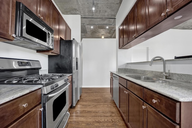 1070 W 15th St Unit 201, Chicago, IL 60608 - kitchen with stainless steel appliances, dark wood finished floors, light countertops, and dark brown cabinetry