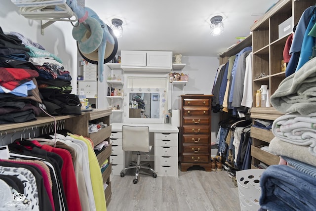 1318 S 6th Ave, Maywood, IL 60153 - walk in closet with light wood finished floors