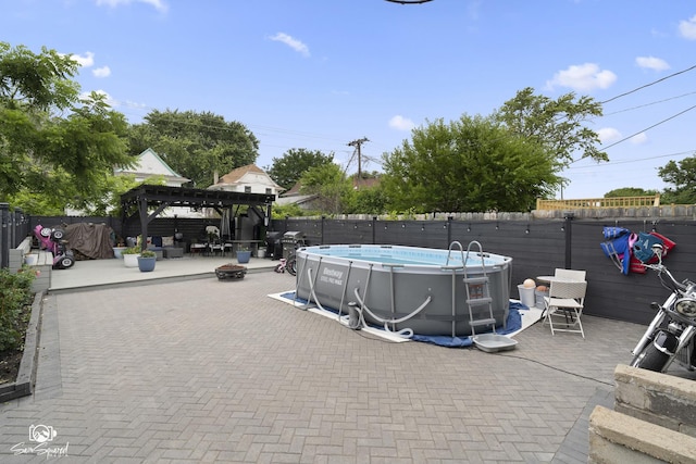 1318 S 6th Ave, Maywood, IL 60153 - view of pool with a fenced backyard, a pergola, and a patio