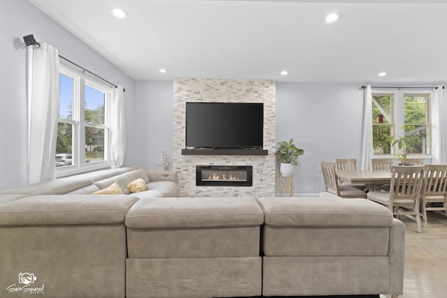1318 S 6th Ave, Maywood, IL 60153 - living area with recessed lighting, wood finished floors, and a fireplace