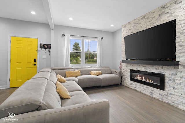 1318 S 6th Ave, Maywood, IL 60153 - living area featuring wood finished floors, recessed lighting, and a stone fireplace