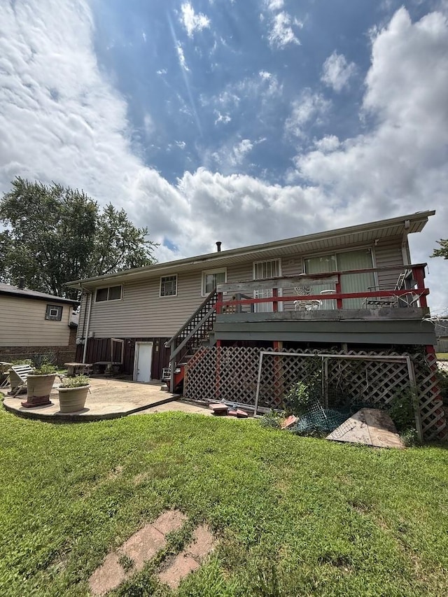 15203 Waterman Dr, South Holland, IL 60473 - back of property with stairs, a wooden deck, a yard, and a patio area