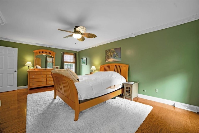19615 116th Ave, Mokena, IL 60448 - bedroom with wood finished floors, ceiling fan, and crown molding