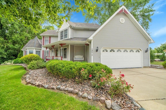 19615 116th Ave, Mokena, IL 60448 - view of front facade featuring concrete driveway, an attached garage, covered porch, a front lawn, and a shingled roof