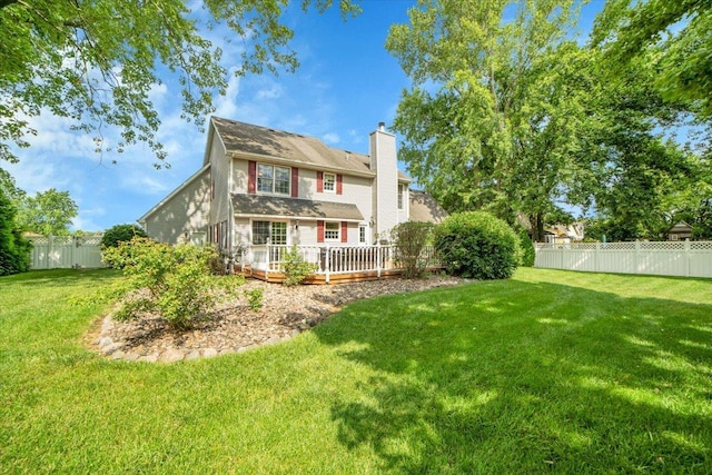 19615 116th Ave, Mokena, IL 60448 - back of property with a chimney, a fenced backyard, and a wooden deck