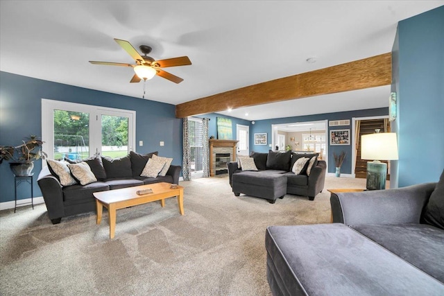 19615 116th Ave, Mokena, IL 60448 - living area with ceiling fan, light carpet, and a glass covered fireplace