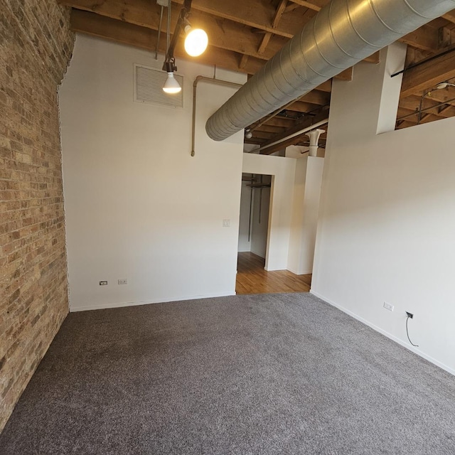 420 S Clinton St Unit 607-A, Chicago, IL 60607 - carpeted spare room featuring brick wall