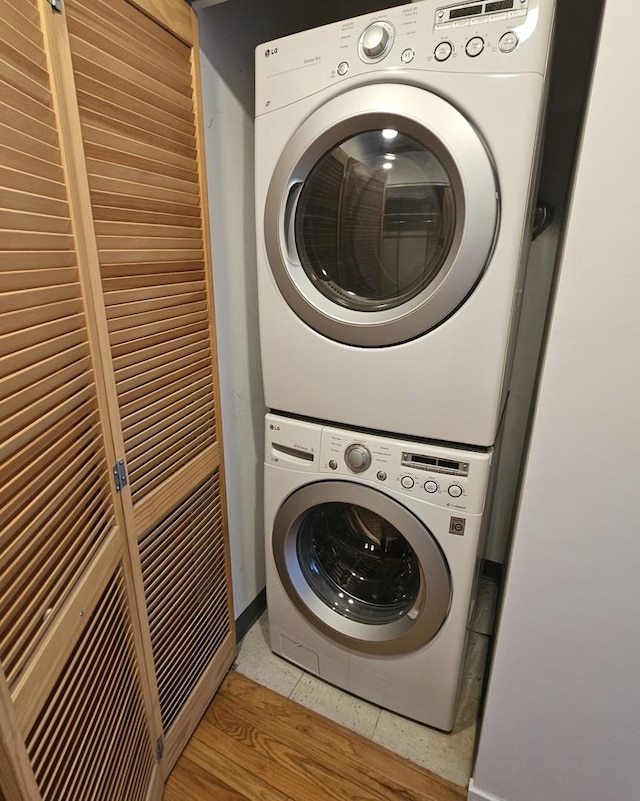 420 S Clinton St Unit 607-A, Chicago, IL 60607 - washroom with stacked washer / drying machine and tile patterned flooring